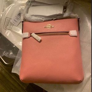 New & Unused coach bag. Mini Rowan File bag in Pink.